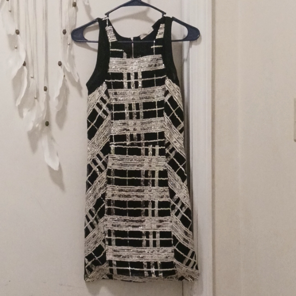 Just me brand. small mini dress. black, silver, and being color.